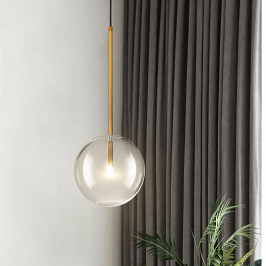 Sylvie - Minimalist Single Gold Pendant: Clear Glass Globe Suspension Lighting